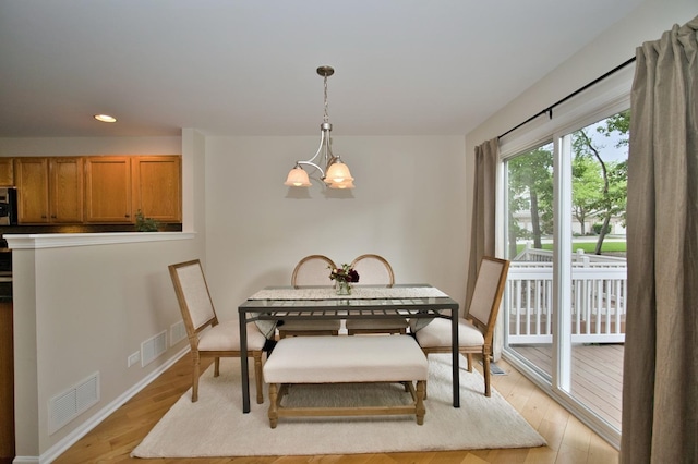 6131 Wingate Dr, Lisle, IL 60532 - dining space featuring light wood finished floors, recessed lighting, a chandelier, and baseboards