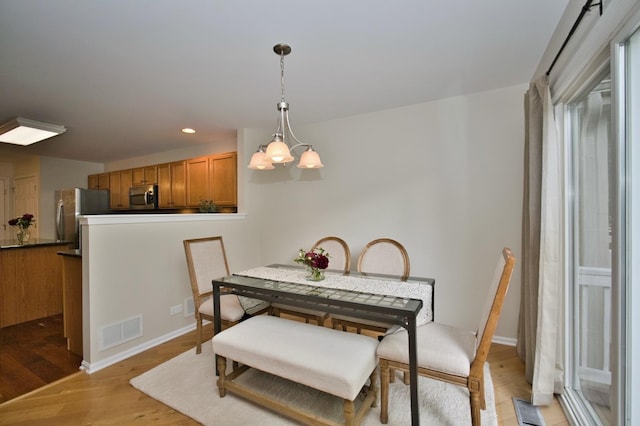 6131 Wingate Dr, Lisle, IL 60532 - dining space with light wood-style floors, recessed lighting, a chandelier, and baseboards