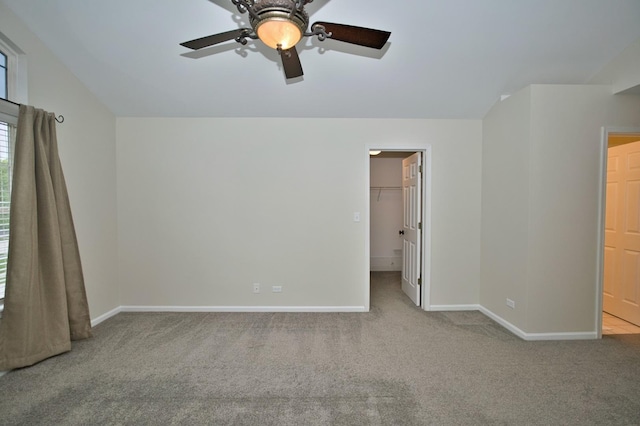 6131 Wingate Dr, Lisle, IL 60532 - unfurnished bedroom featuring carpet, baseboards, a walk in closet, and ceiling fan