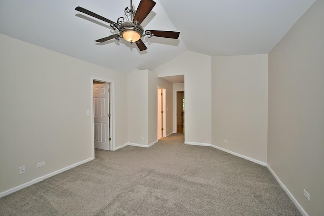 6131 Wingate Dr, Lisle, IL 60532 - spare room with carpet, ceiling fan, lofted ceiling, and baseboards