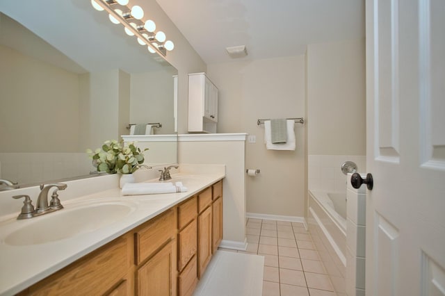 6131 Wingate Dr, Lisle, IL 60532 - full bathroom featuring tile patterned floors, a garden tub, double vanity, and baseboards