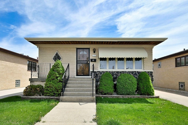 4937 N Sayre Ave, Chicago, IL 60656 - view of front of property with a front lawn