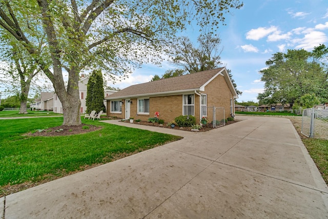 1455 Reckinger Rd, Aurora, IL 60505 - view of front of home with driveway and brick siding