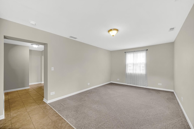 1455 Reckinger Rd, Aurora, IL 60505 - tiled empty room with baseboards and a smoke detector