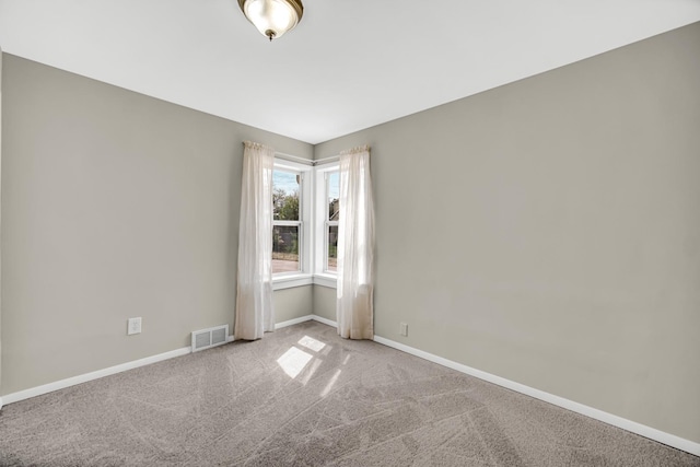1455 Reckinger Rd, Aurora, IL 60505 - empty room featuring carpet flooring and baseboards