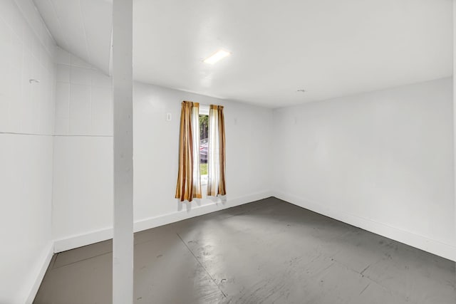 1455 Reckinger Rd, Aurora, IL 60505 - spare room with baseboards and concrete flooring