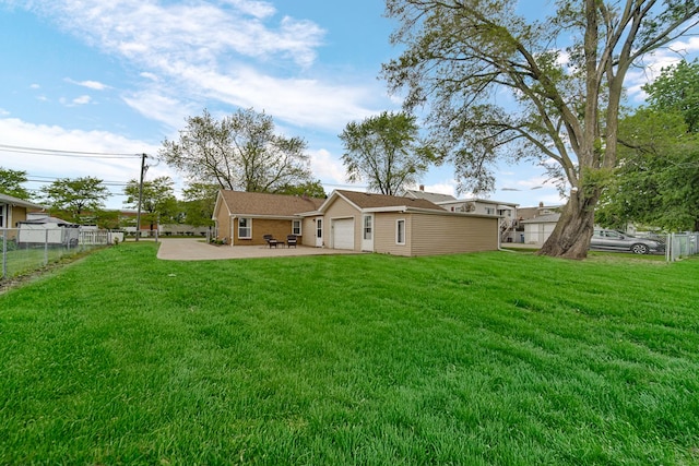 1455 Reckinger Rd, Aurora, IL 60505 - rear view of house featuring a garage and a patio