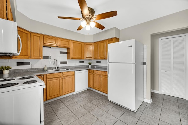 1455 Reckinger Rd, Aurora, IL 60505 - kitchen with white appliances, a sink, a ceiling fan, light tile patterned floors, and decorative backsplash