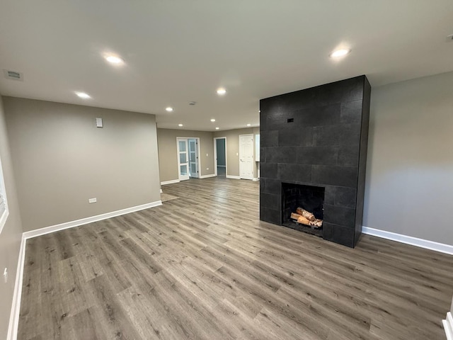 363 Indianwood Blvd, Park Forest, IL 60466 - unfurnished living room featuring recessed lighting, wood finished floors, and a fireplace