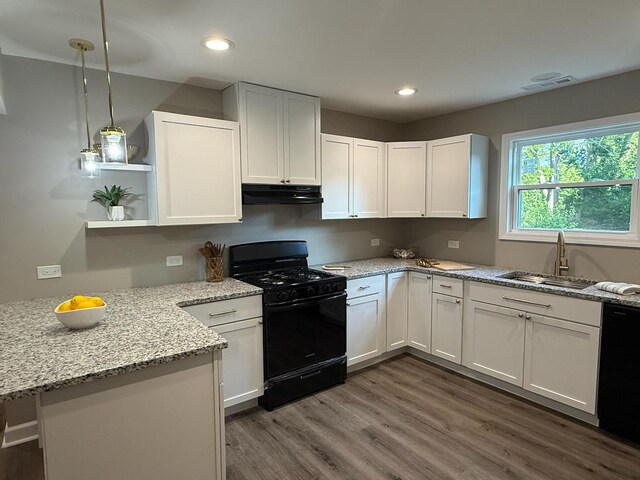 363 Indianwood Blvd, Park Forest, IL 60466 - kitchen with a peninsula, white cabinets, dark wood-style floors, light stone countertops, and hanging light fixtures