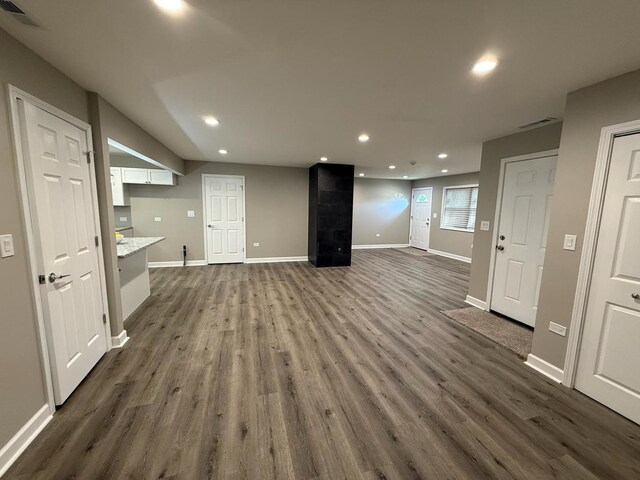 363 Indianwood Blvd, Park Forest, IL 60466 - dining space with light wood-type flooring, a tile fireplace, and recessed lighting