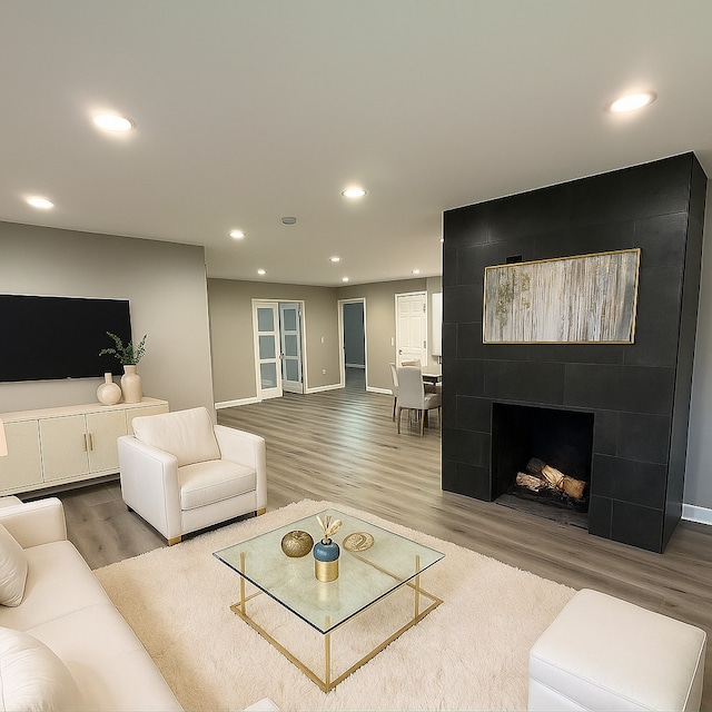 363 Indianwood Blvd, Park Forest, IL 60466 - living area featuring wood finished floors, recessed lighting, and a tile fireplace