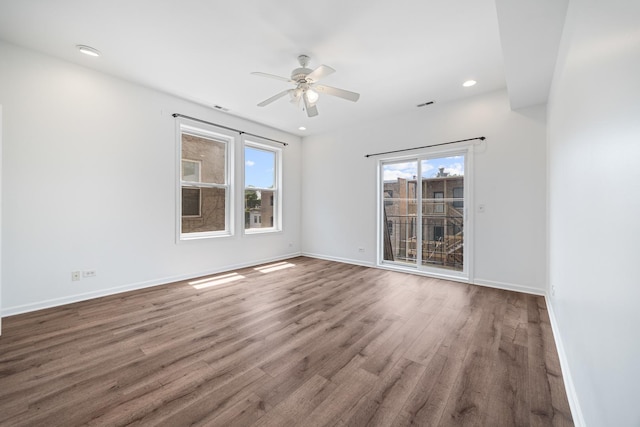4800 S St Lawrence Ave Unit 3S, Chicago, IL 60615 - spare room with plenty of natural light, ceiling fan, wood finished floors, and recessed lighting