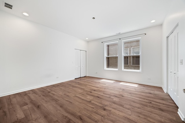 4800 S St Lawrence Ave Unit 3S, Chicago, IL 60615 - spare room with wood finished floors and recessed lighting
