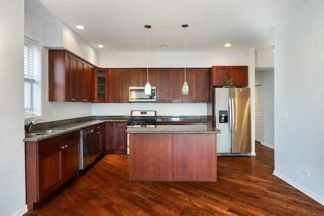 4800 S St Lawrence Ave Unit 3S, Chicago, IL 60615 - kitchen with stainless steel appliances, dark wood-style flooring, a center island, pendant lighting, and recessed lighting