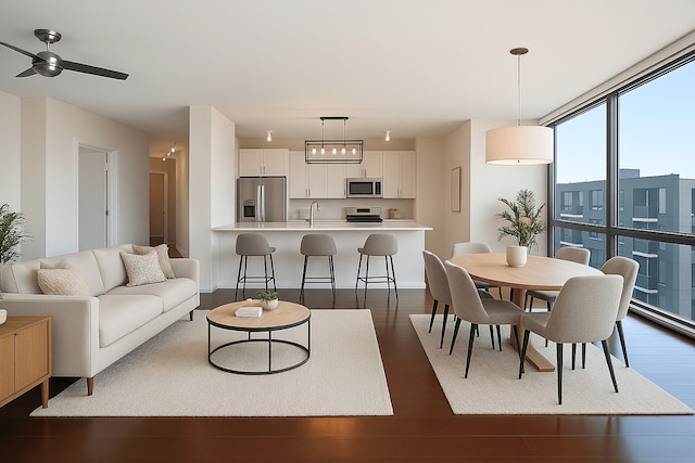 123 S Green St Unit 1101B, Chicago, IL 60607 - living area featuring dark wood-type flooring, a ceiling fan, and baseboards