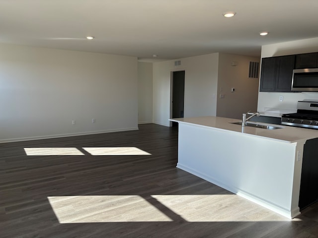 2274 Elderberry Ct, Wonder Lake, IL 60097 - kitchen featuring appliances with stainless steel finishes, a sink, dark wood-style floors, recessed lighting, and baseboards