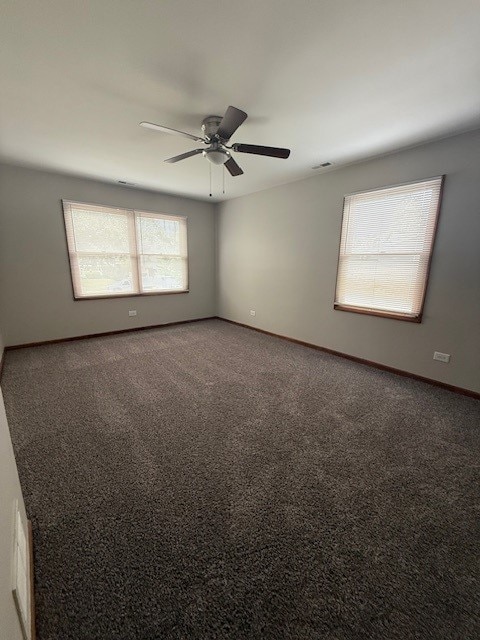 674 E Algonquin Rd, Des Plaines, IL 60016 - spare room with ceiling fan, carpet floors, and baseboards