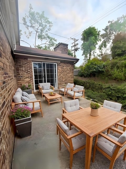 674 E Algonquin Rd, Des Plaines, IL 60016 - view of patio / terrace featuring an outdoor hangout area and outdoor dining space