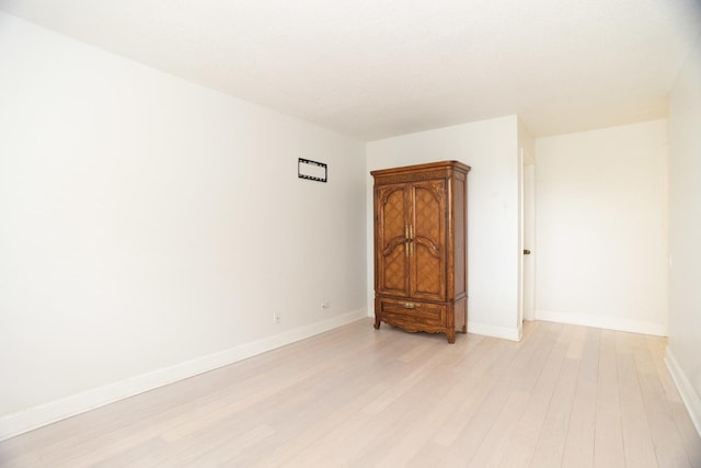 2 S Atrium Way Unit 208, Elmhurst, IL 60126 - spare room with light wood-style flooring and baseboards