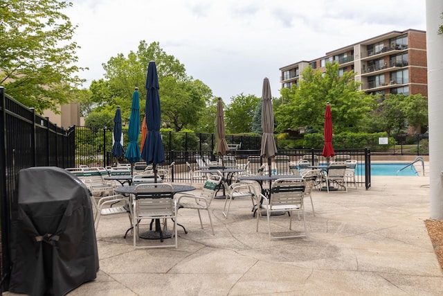 2 S Atrium Way Unit 208, Elmhurst, IL 60126 - view of patio / terrace with a grill and a community pool