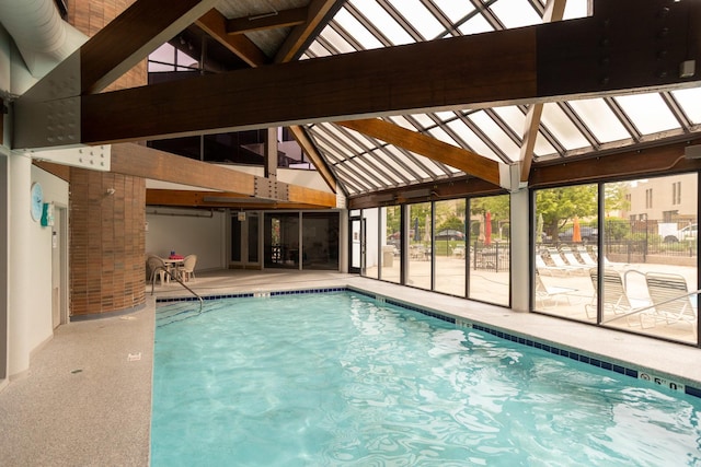 2 S Atrium Way Unit 208, Elmhurst, IL 60126 - indoor community pool featuring a patio area