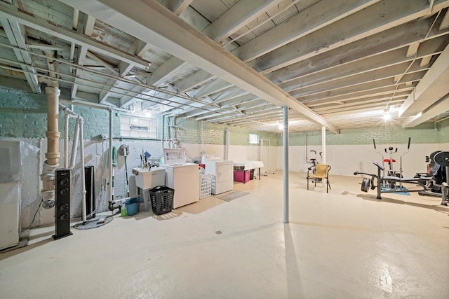 3052 E 97th St, Chicago, IL 60617 - basement with washer and clothes dryer and a sink