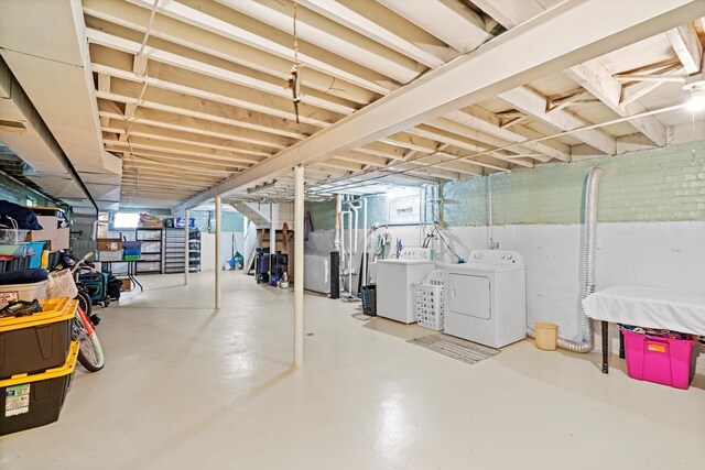 3052 E 97th St, Chicago, IL 60617 - below grade area featuring washer and clothes dryer