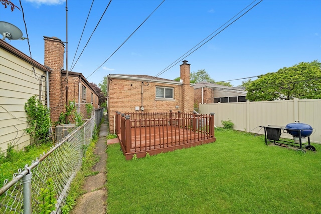 3052 E 97th St, Chicago, IL 60617 - rear view of property featuring brick siding, a chimney, and cooling unit