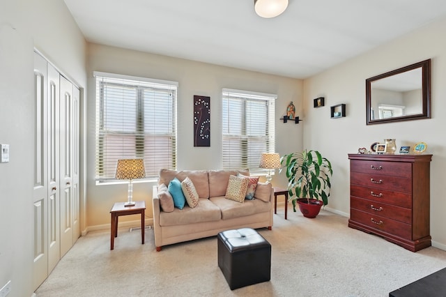 308 E 25th Pl, Chicago, IL 60616 - carpeted living area with baseboards