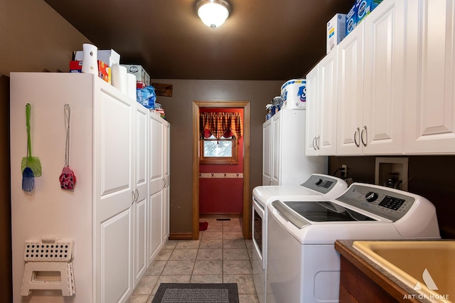 17207 Chase Rd, Dekalb, IL 60115 - laundry room with cabinet space, separate washer and dryer, and baseboards