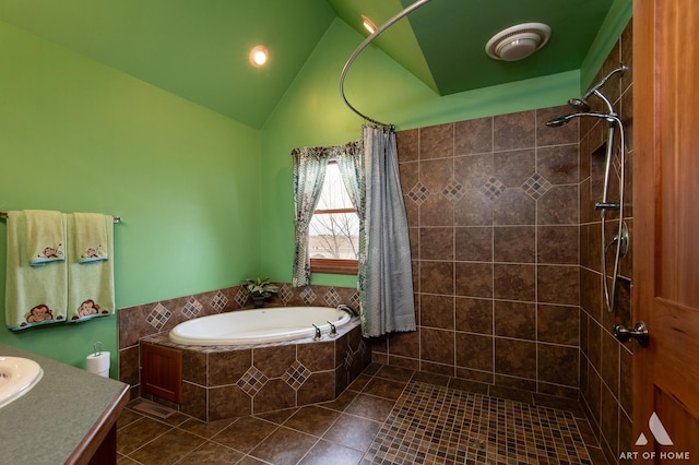 17207 Chase Rd, Dekalb, IL 60115 - full bath featuring a garden tub, tile patterned floors, tiled shower, vanity, and vaulted ceiling