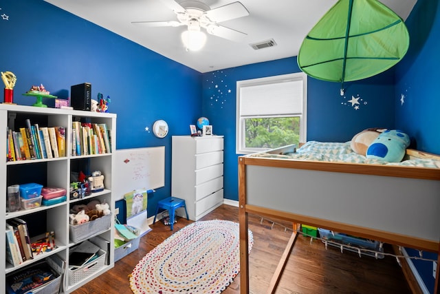 5510 S Cornell Ave Unit E, Chicago, IL 60637 - bedroom with wood finished floors, a ceiling fan, and baseboards