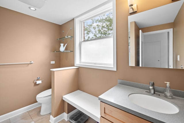 5510 S Cornell Ave Unit E, Chicago, IL 60637 - bathroom featuring vanity, toilet, baseboards, and tile patterned flooring