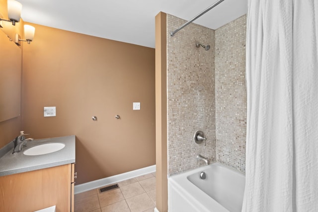 5510 S Cornell Ave Unit E, Chicago, IL 60637 - full bath with tile patterned floors, vanity, shower / tub combo, and baseboards