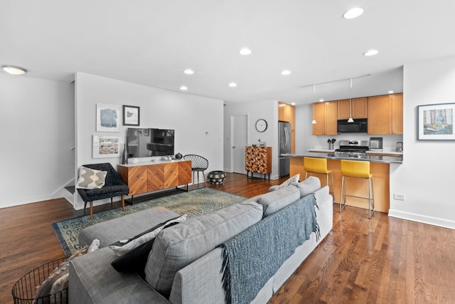 5510 S Cornell Ave Unit E, Chicago, IL 60637 - living room with recessed lighting, dark wood-type flooring, and baseboards