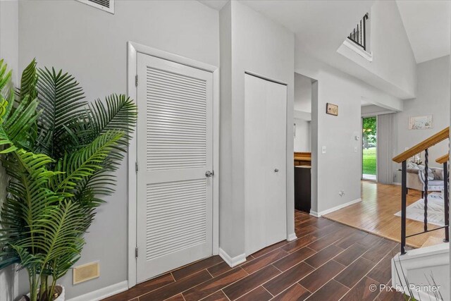 184 Golfview Dr, Glendale Heights, IL 60139 - hallway featuring dark wood-style flooring and baseboards