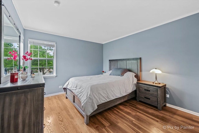184 Golfview Dr, Glendale Heights, IL 60139 - bedroom featuring wood finished floors, baseboards, and crown molding