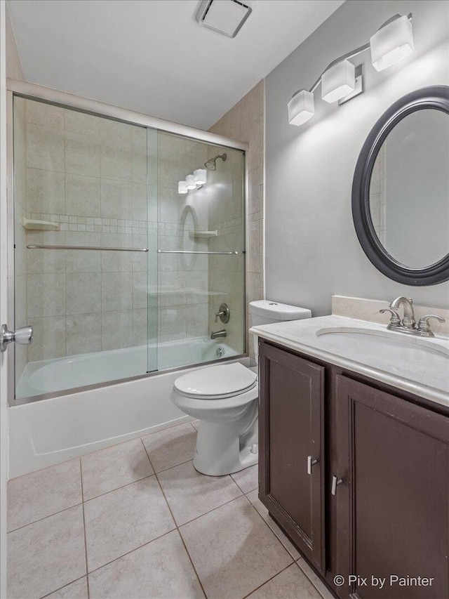 184 Golfview Dr, Glendale Heights, IL 60139 - full bathroom featuring vanity, toilet, bath / shower combo with glass door, and tile patterned floors