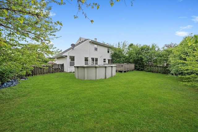 1553 Brandywyn Ct N, Buffalo Grove, IL 60089 - view of yard with a wooden deck