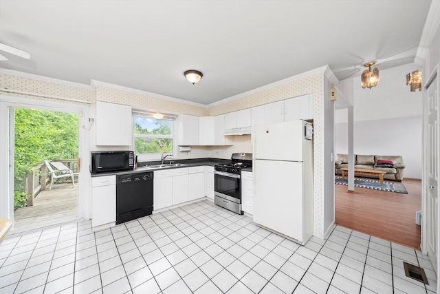 1553 Brandywyn Ct N, Buffalo Grove, IL 60089 - kitchen with black appliances, crown molding, a ceiling fan, wallpapered walls, and a sink