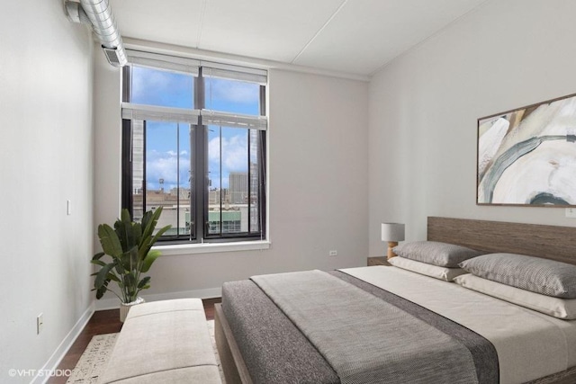 660 W Wayman St Unit 701, Chicago, IL 60661 - bedroom featuring wood finished floors, baseboards, and multiple windows