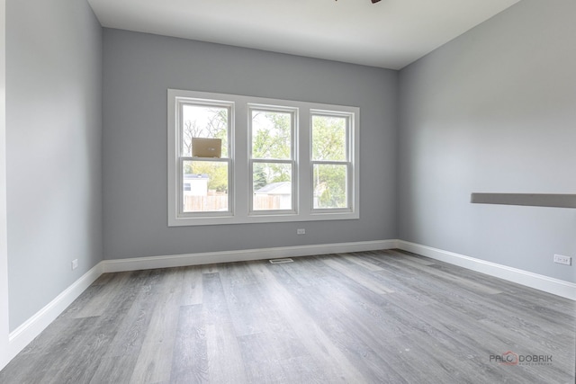 196 Southgate Ave, Chicago Heights, IL 60411 - spare room featuring wood finished floors and baseboards
