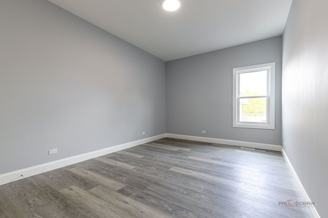 196 Southgate Ave, Chicago Heights, IL 60411 - unfurnished room featuring baseboards and wood finished floors