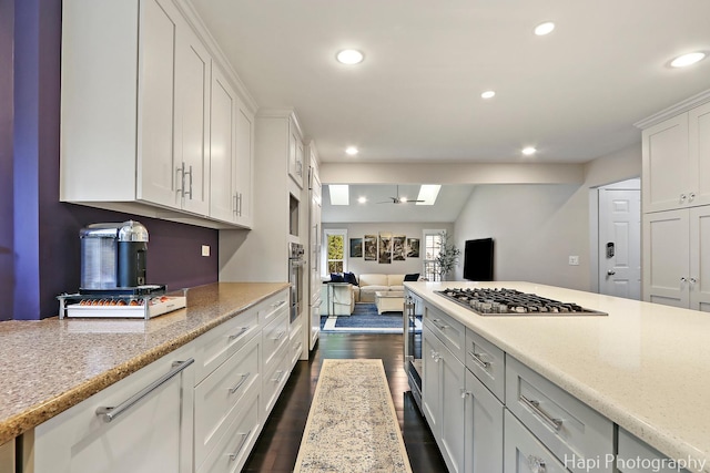 1116 Stonegate Ct, Bartlett, IL 60103 - kitchen featuring open floor plan, recessed lighting, white cabinetry, dark wood-style floors, and stainless steel appliances