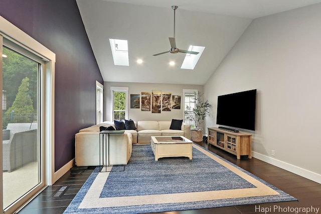 1116 Stonegate Ct, Bartlett, IL 60103 - living area with a skylight, dark wood finished floors, high vaulted ceiling, ceiling fan, and baseboards