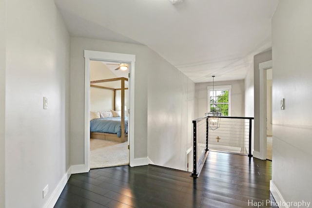 1116 Stonegate Ct, Bartlett, IL 60103 - corridor with an upstairs landing, baseboards, and dark wood-style flooring