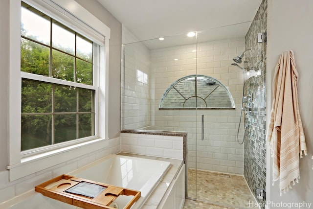 1116 Stonegate Ct, Bartlett, IL 60103 - bathroom featuring healthy amount of natural light, a stall shower, a bath, and recessed lighting