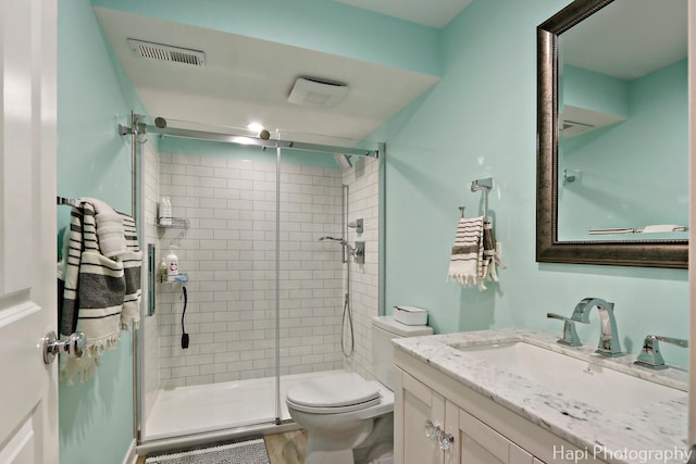 1116 Stonegate Ct, Bartlett, IL 60103 - full bathroom featuring vanity, toilet, and a stall shower