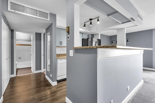 850 Wellington Ave Unit 515, Elk Grove Village, IL 60007 - kitchen with freestanding refrigerator, white dishwasher, baseboards, tasteful backsplash, and dark wood-style flooring